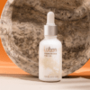 frankincense face oil in a small tube bottle