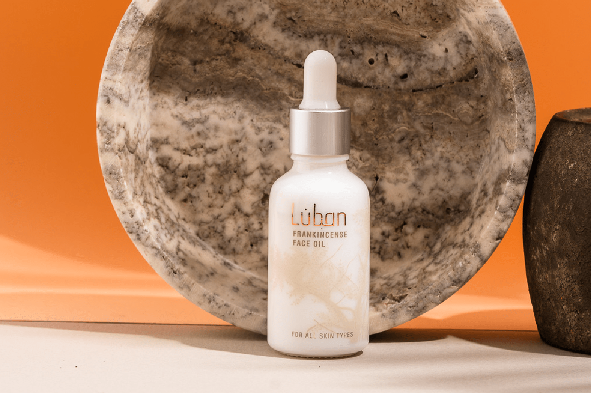 frankincense face oil in a small tube bottle