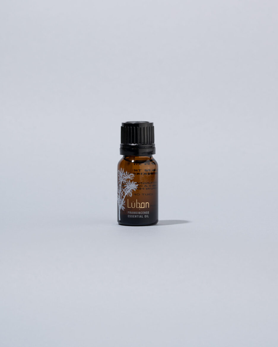 Frankincense essential oil in a small bottle